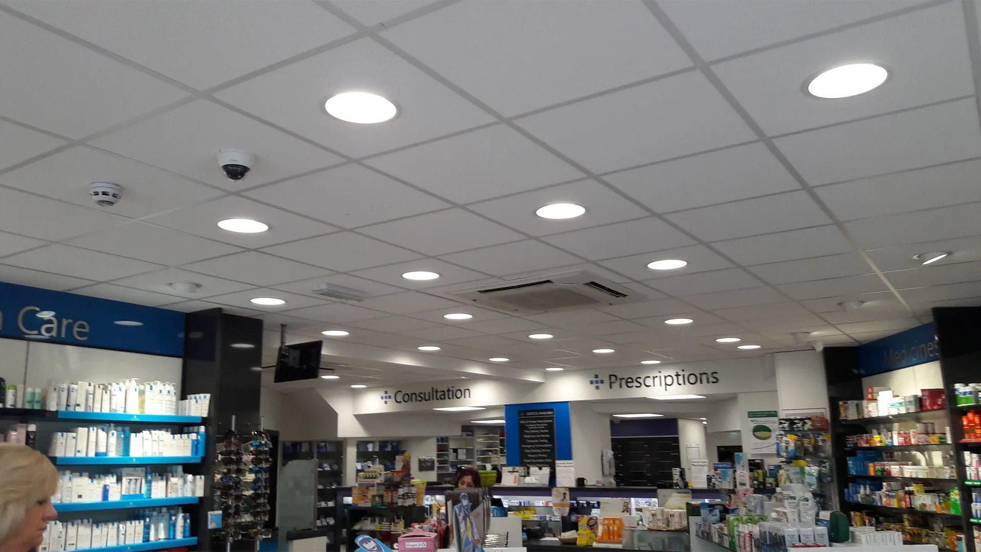 Pharmacy ceiling with recessed lighting in Teddington by CMD Ceilings Ltd